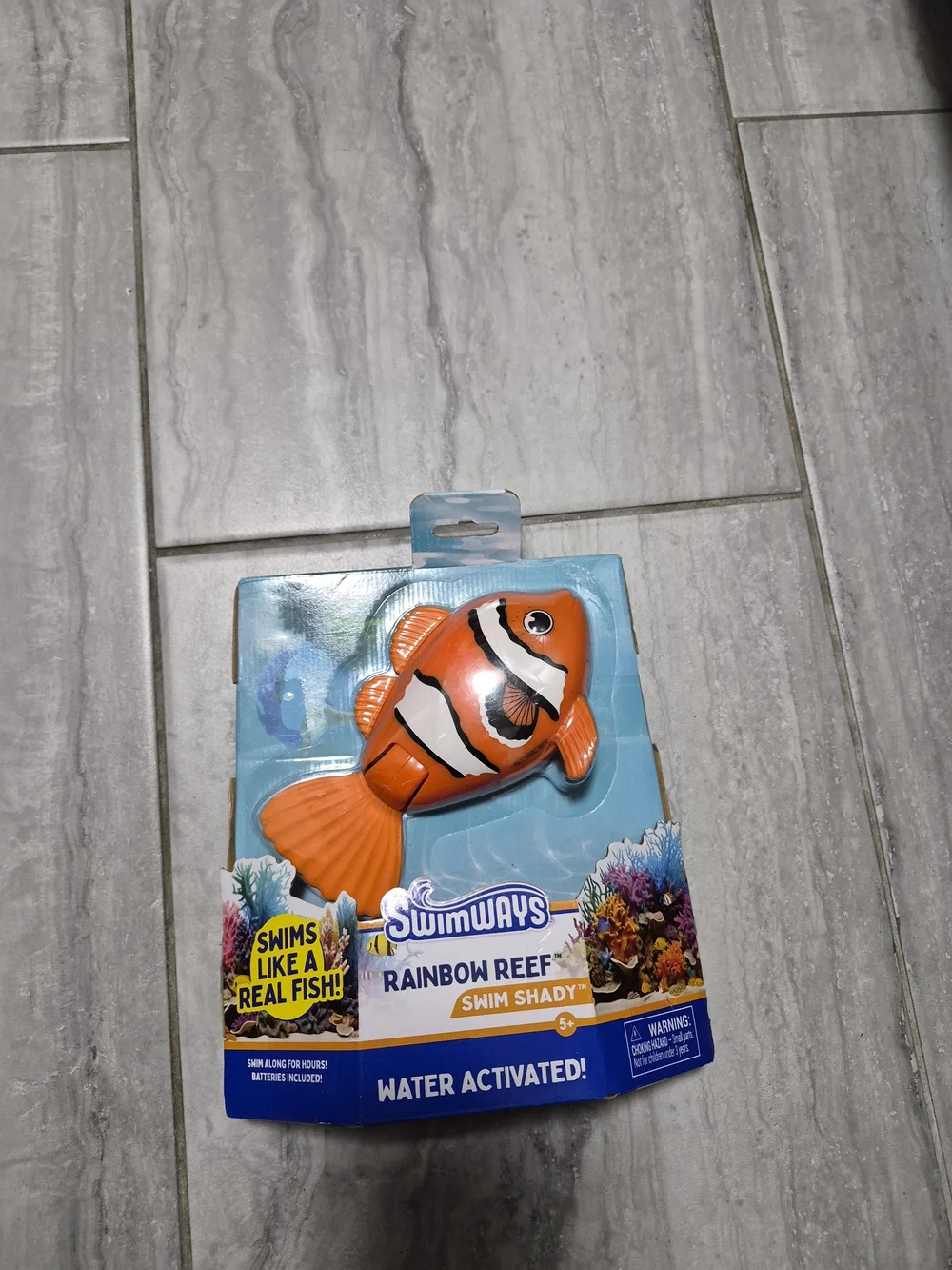 Swimways Rainbow Reef Swim Shady Water-Activated Orange Clownfish Toy 5+